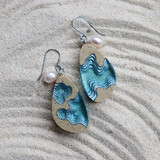 Rockpool large beach sand and blue resin earrings on sand