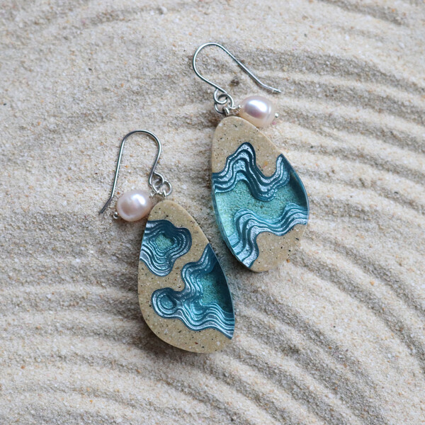 Rockpool large beach sand and blue resin earrings on sand